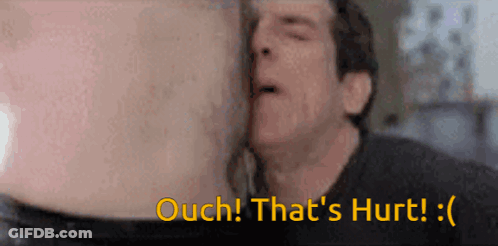 A Man Kissing Another Man 'S Stomach With The Words Ouch That 'S Hurt Written Below Him GIF