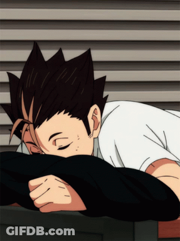 A Man Laying Down With His Head On His Arm GIF
