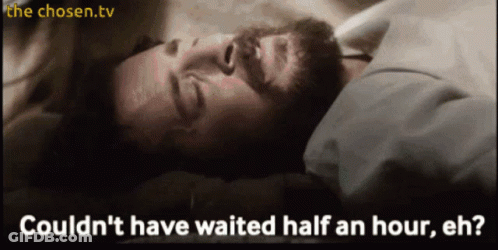 A Man Laying In Bed With The Words " Could N't Have Waited Half An Hour Eh " On The Bottom GIF