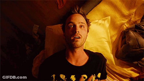 A Man Laying On A Bed Wearing A T-Shirt That Says 1 2 3 GIF