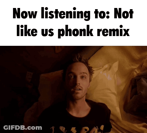 A Man Laying On A Bed With The Words Now Listening To : Not Like Us Phonk Remix Above Him GIF