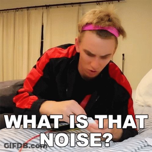 A Man Laying On A Bed With The Words " What Is That Noise " GIF