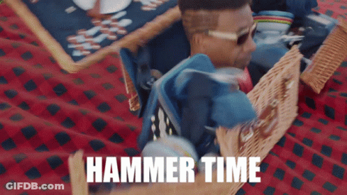 A Man Laying On A Picnic Blanket With The Words Hammer Time Written On The Bottom GIF