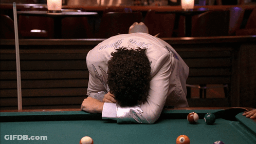 A Man Laying On A Pool Table With The Word Prince On His Back GIF