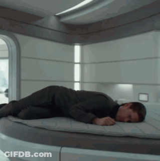 Man Lying On Bed In Room GIF