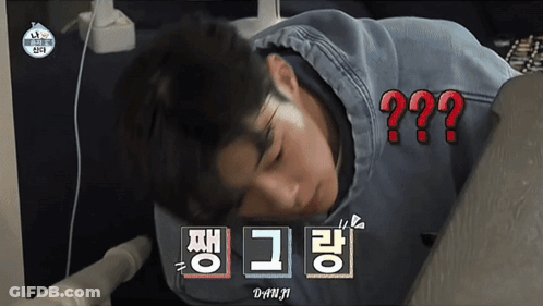 A Man Laying On His Stomach With A Question Mark Above Him In Red GIF