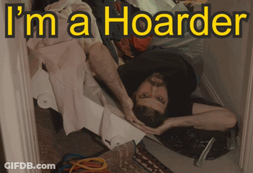A Man Laying On The Floor With The Caption I 'M A Hoarder GIF