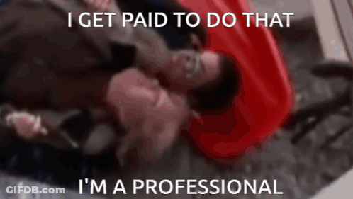 A Man Laying On The Floor With The Words I Get Paid To Do That I 'M A Professional Written Below Him GIF