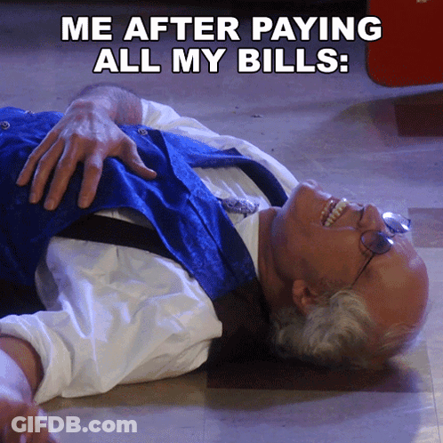 A Man Laying On The Floor With The Words Me After Paying All My Bills GIF