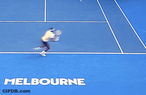 A Man Laying On The Ground On A Tennis Court With The Word Melbourne Written On It GIF