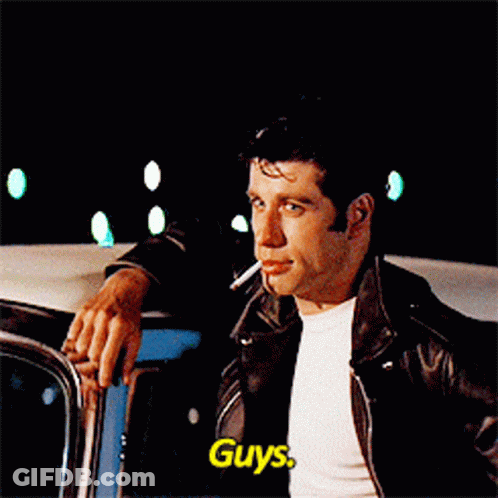 A Man Leaning Against A Car With A Cigarette In His Mouth And Says Guys GIF