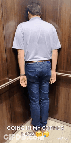 A Man Leaning Against A Wall In An Elevator With Going In My Corner Now Written Below Him GIF