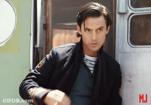 A Man Leaning Against A Wall With The Letters Mj On The Bottom GIF