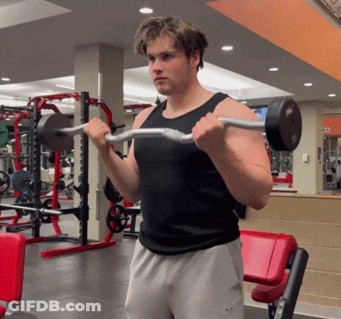 Man Lifting Barbell In Gym GIF