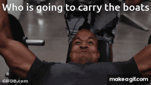 A Man Lifting A Barbell With The Words Who Is Going To Carry The Boats Above Him GIF