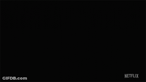 A Man Lighting A Match Next To Another Man With A Netflix Logo On The Bottom GIF