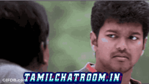 A Man Looking At Another Man With Tamilchatroom.in Written On The Bottom Right GIF