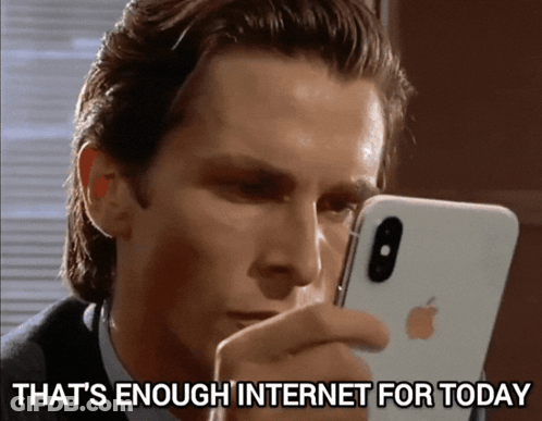 A Man Looking At His Phone With The Words That 'S Enough Internet For Today GIF