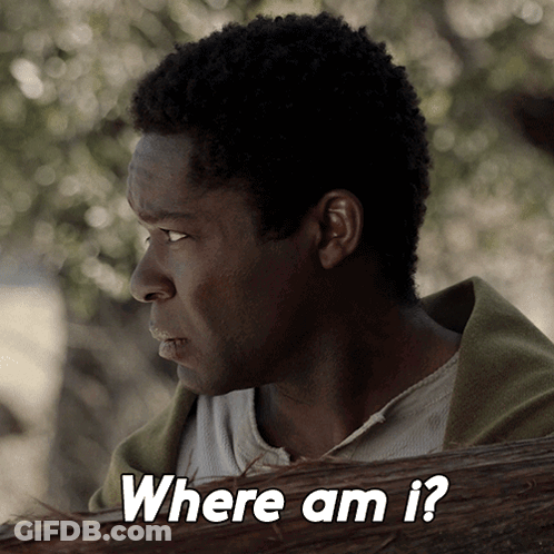 A Man Looking Over A Wooden Fence With The Words Where Am I GIF