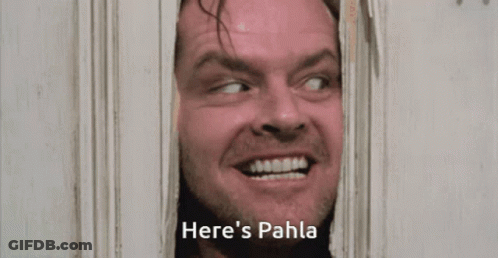 A Man Looking Through A Door With The Words Here 'S Pahla Written Below Him GIF