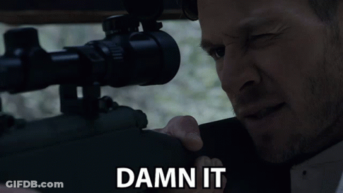 A Man Looking Through A Sniper Scope With The Words Damn It Above Him GIF