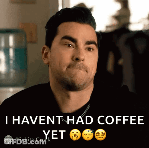 A Man Making A Face With The Words " I Haven T Had Coffee Yet " Next To Him GIF