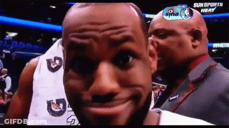 A Man Making A Funny Face In Front Of A Screen That Says Sun Sports Heat GIF