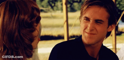 A Man Making A Funny Face While Looking At A Woman GIF