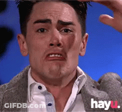 A Man Making A Funny Face With Hayu Written On The Bottom Right GIF