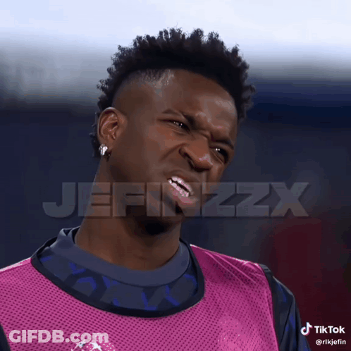 A Man Making A Funny Face With The Word Jefinzzx On The Bottom GIF
