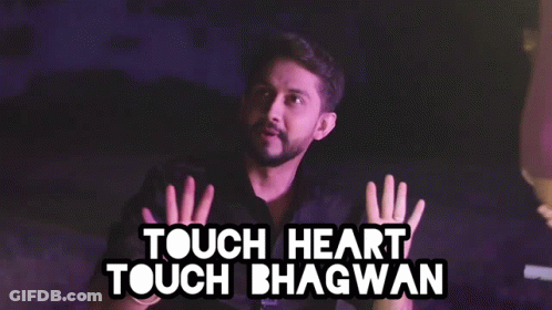 A Man Making A Funny Face With The Words Touch Heart Touch Bhagwan Above Him GIF
