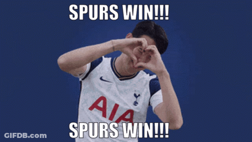 A Man Making A Heart With His Hands And The Words Spurs Win GIF