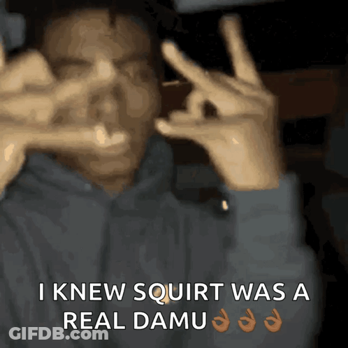A Man Making A Peace Sign With His Hands And The Words I Knew Squirt Was A Real Damu GIF