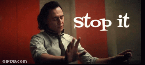 A Man Making A Stop Sign With The Word Stop It Above Him GIF