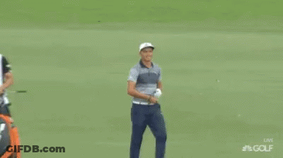 A Man Named Rickie Fowler Is Standing On A Green GIF