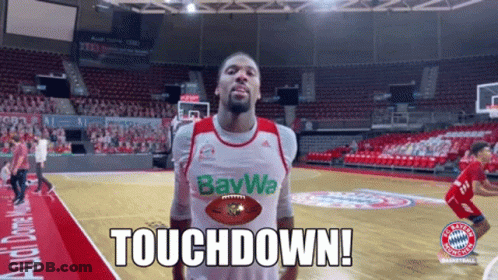 A Man On A Basketball Court With The Words Touchdown On The Bottom GIF