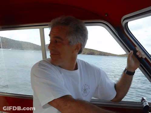 A Man On A Boat Wearing A White Shirt That Says " Sydney " GIF