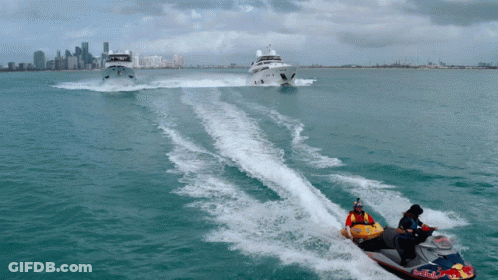 A Man On A Jet Ski That Says Red Bull GIF