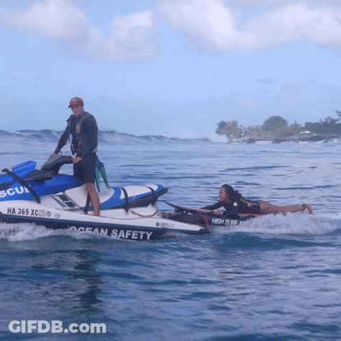 A Man On A Jet Ski With The Word Ocean Safety On It GIF