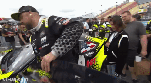 A Man On A Motorcycle With The Word Mdex On The Front GIF
