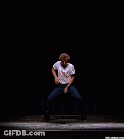 A Man On A Stage Wearing A White Shirt That Says " It 'S A Pa " GIF