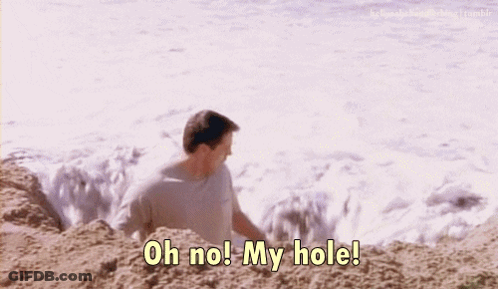 A Man On The Beach Says " Oh No! My Hole " GIF
