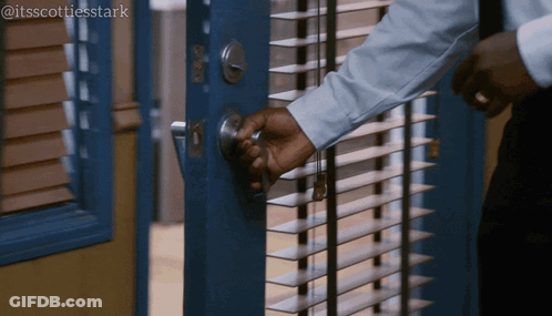 A Man Opens A Blue Door With Blinds And A Caption That Says " Itsscottiesstark " GIF