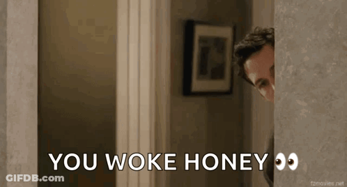 A Man Peeking Out From Behind A Door With The Words You Woke Honey Written On It GIF
