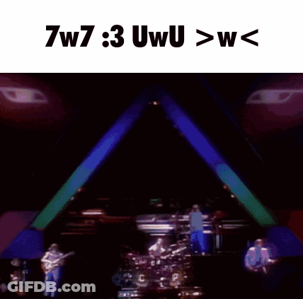 A Man Playing A Guitar And Singing Into A Microphone With The Words 7W7 3 Uwu > W < Below Him GIF