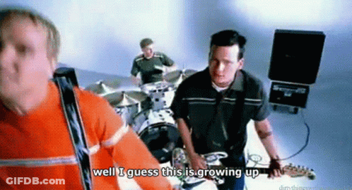 A Man Playing A Guitar In A Band With The Words Well I Guess This Is Growing Up GIF