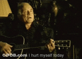 A Man Playing A Guitar With The Words " I Hurt Myself Today " Next To Him GIF