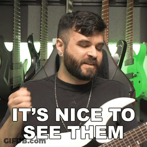 A Man Playing A Guitar With The Words It 'S Nice To See Them GIF