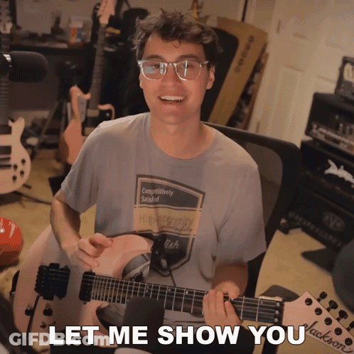 Guitar Player With Let Me Show You Text GIF