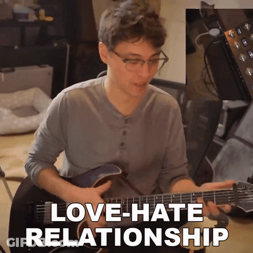 Guitarist With Love-Hate Relationship Text GIF